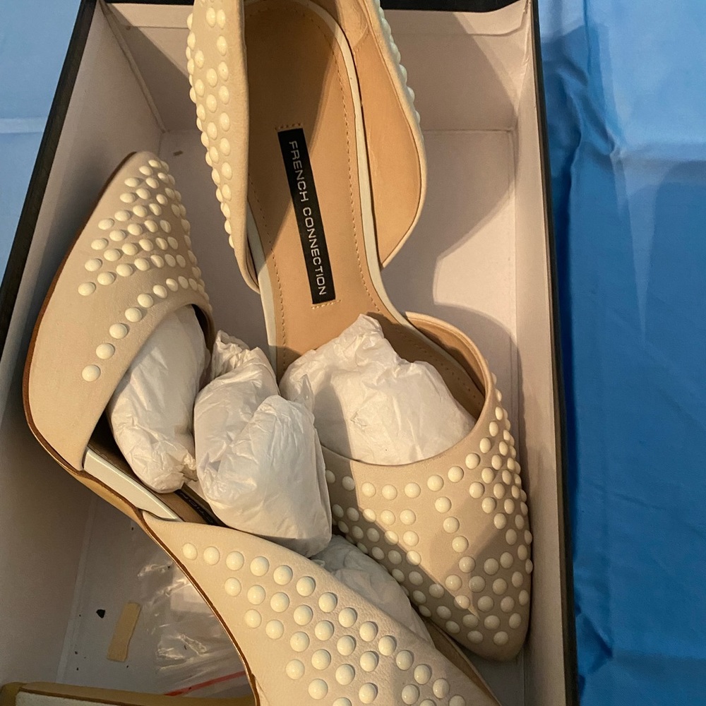 Winter white pumps , US size 9, worn only once for pictures. Great condition.